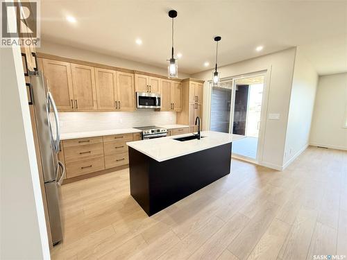 161 Delaet Drive, Weyburn, SK - Indoor Photo Showing Kitchen With Upgraded Kitchen