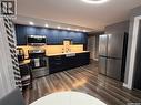 1128 Sidney Street E, Swift Current, SK  - Indoor Photo Showing Kitchen With Stainless Steel Kitchen 