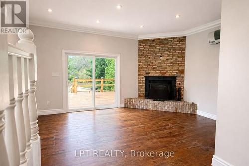228 Pine Cove Road, Burlington, ON - Indoor Photo Showing Living Room With Fireplace