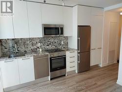 2210 - 28 WELLESLEY STREET E  Toronto, ON M4Y 0C4