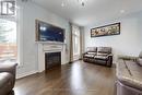 5430 Oscar Peterson Boulevard, Mississauga, ON  - Indoor Photo Showing Living Room With Fireplace 