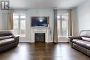 5430 Oscar Peterson Boulevard, Mississauga, ON  - Indoor Photo Showing Living Room With Fireplace 