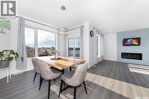 1038 Childers Court, Saskatoon, SK - Indoor Photo Showing Other Room With Fireplace