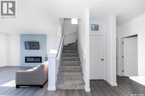 1038 Childers Court, Saskatoon, SK - Indoor With Fireplace