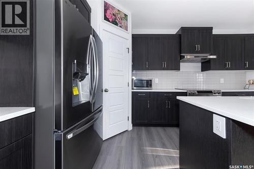 1038 Childers Court, Saskatoon, SK - Indoor Photo Showing Kitchen With Upgraded Kitchen
