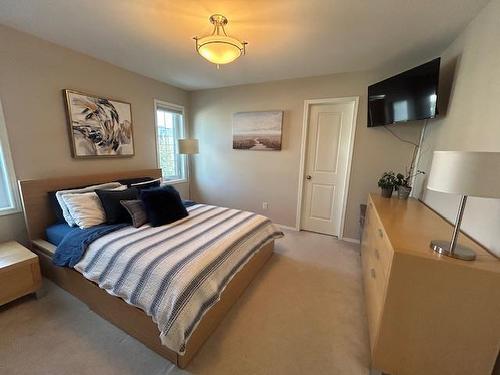 Upper level - Primary bedroom - 115 Bellflower Road, Winnipeg, MB - Indoor Photo Showing Bedroom
