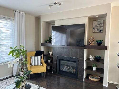 Great Room - 115 Bellflower Road, Winnipeg, MB - Indoor Photo Showing Living Room With Fireplace