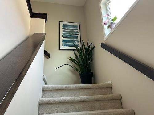 Staircase to upper level - 115 Bellflower Road, Winnipeg, MB - Indoor Photo Showing Other Room