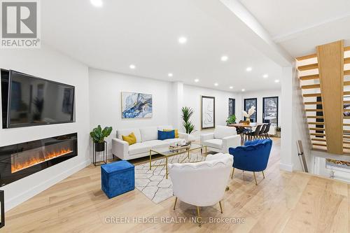 33 Dagwell Crescent, Ajax, ON - Indoor Photo Showing Living Room With Fireplace