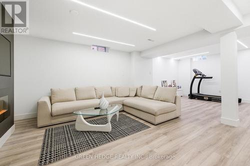 33 Dagwell Crescent, Ajax, ON - Indoor Photo Showing Living Room With Fireplace