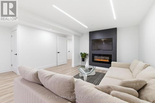 33 Dagwell Crescent, Ajax, ON - Indoor Photo Showing Living Room With Fireplace