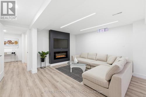 33 Dagwell Crescent, Ajax, ON - Indoor Photo Showing Other Room With Fireplace
