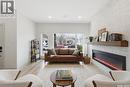 1314 Empress Avenue, Saskatoon, SK  - Indoor Photo Showing Living Room With Fireplace 