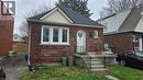 The property features a brick exterior, a driveway, and a front yard with a walkway leading to the front entrance - 66 Cline Avenue Unit# Main Floor, Hamilton, ON  - Outdoor With Exterior 