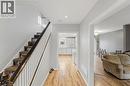 The property features hardwood flooring throughout the main level - 99 Robins Avenue, Hamilton, ON  - Indoor Photo Showing Other Room 