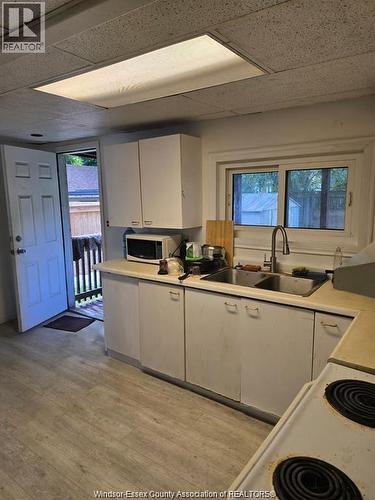 3242 Baby Street, Windsor, ON - Indoor Photo Showing Kitchen With Double Sink
