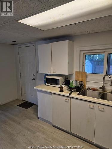 3242 Baby Street, Windsor, ON - Indoor Photo Showing Kitchen With Double Sink