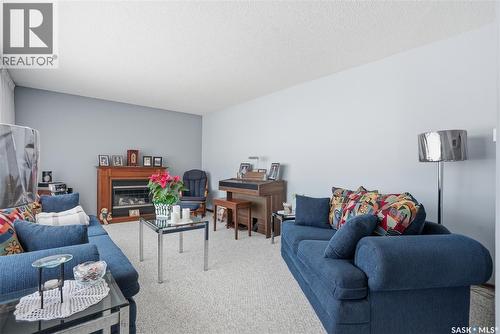 68 Deborah Crescent, Saskatoon, SK - Indoor Photo Showing Living Room With Fireplace