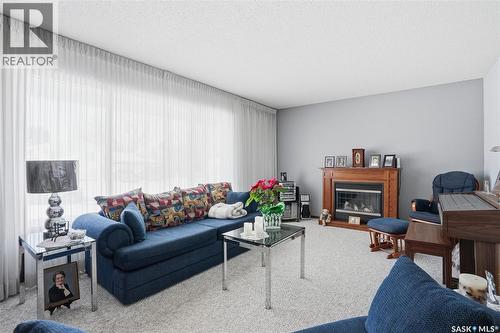 68 Deborah Crescent, Saskatoon, SK - Indoor Photo Showing Living Room With Fireplace