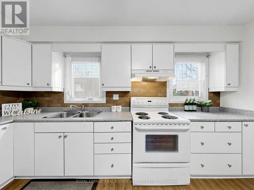 21 - 530 Falgarwood Drive, Oakville, ON - Indoor Photo Showing Kitchen With Double Sink