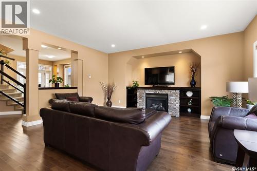 4813 Upson Road, Regina, SK - Indoor Photo Showing Living Room With Fireplace
