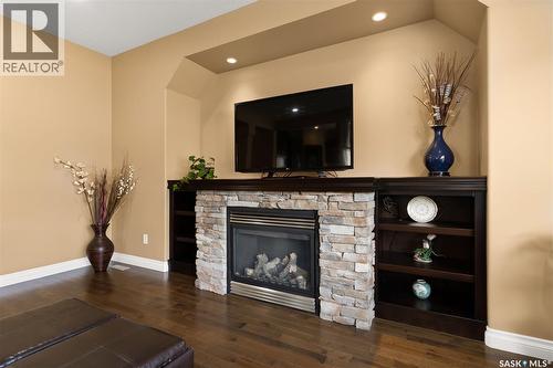 4813 Upson Road, Regina, SK - Indoor Photo Showing Living Room With Fireplace