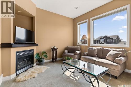 4813 Upson Road, Regina, SK - Indoor Photo Showing Living Room With Fireplace