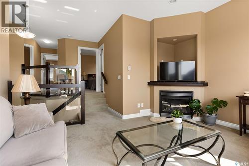 4813 Upson Road, Regina, SK - Indoor Photo Showing Living Room With Fireplace