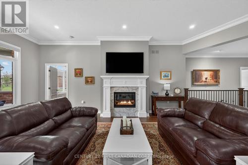 1307 Sandy Somerville Drive, London South (South A), ON - Indoor Photo Showing Living Room With Fireplace