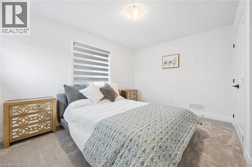 Bedroom featuring white walls and grey carpet flooring - 213 Fallowfield Drive, Kitchener, ON - Indoor Photo Showing Bedroom