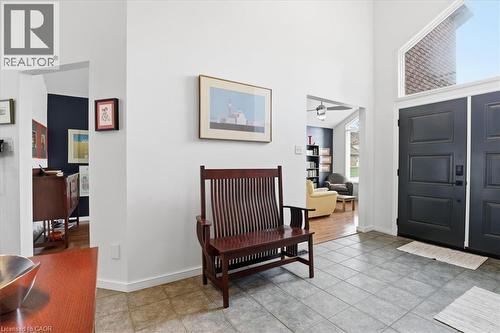 Entryway featuring a double door with glass transom, high vaulted ceilings, and tiled flooring - 110 Milton Avenue, Cambridge, ON - Indoor Photo Showing Other Room
