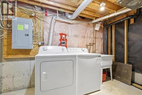Laundry area featuring a washer, dryer, and utility sink - 110 Milton Avenue, Cambridge, ON - Indoor Photo Showing Laundry Room