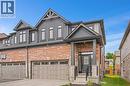Contemporary brick and dark siding exterior with prominent gables - 1026 Wright Drive, Midland, ON  - Outdoor 