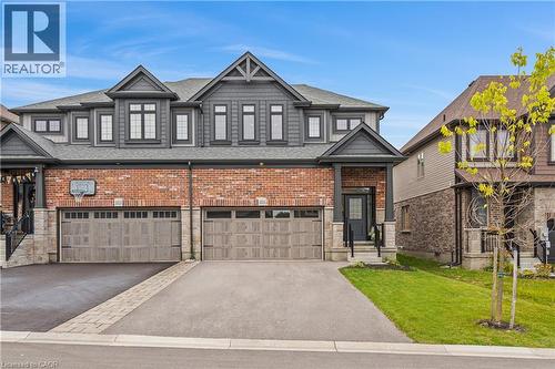 Contemporary facade featuring brick and charcoal-toned siding - 1026 Wright Drive, Midland, ON - Outdoor With Facade