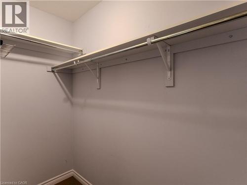 This property includes shelving and clothing rods - 338 Maverick Street, Waterloo, ON - Indoor With Storage