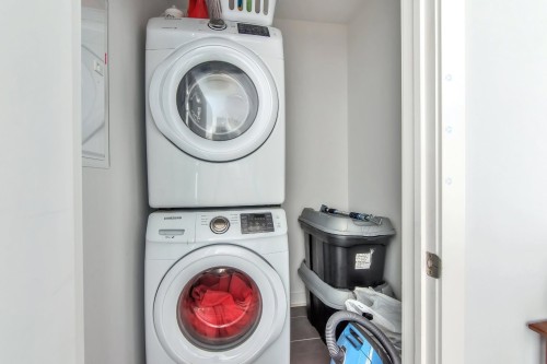 Salle de lavage - 409-145 Boul. Bouchard, Dorval, QC - Indoor Photo Showing Laundry Room