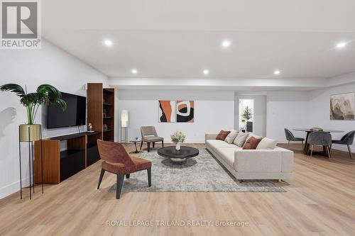 Basement virtually staged - 3455 Grand Oak Crossing, London South (South V), ON - Indoor Photo Showing Living Room