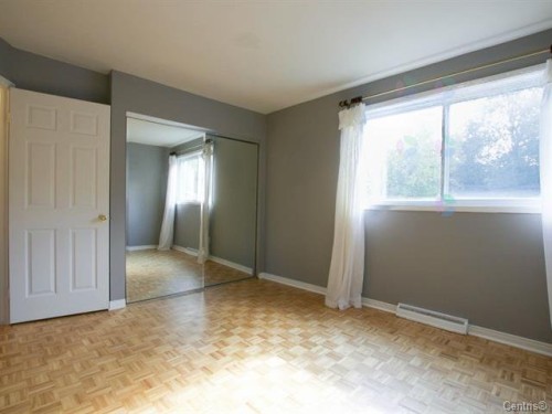 Chambre à coucher principale - 91 Rue Radisson, Pincourt, QC - Indoor Photo Showing Other Room