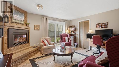Recreation Room with Fireplace - 14 - 178 Scott Street, St. Catharines (Fairview), ON - Indoor Photo Showing Living Room With Fireplace