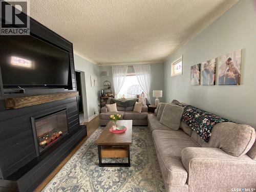 216 Second Avenue N, Yorkton, SK - Indoor Photo Showing Living Room With Fireplace