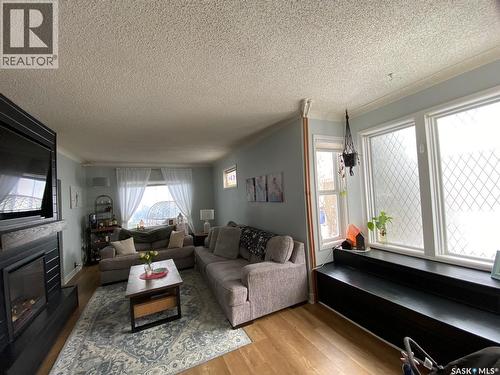 216 Second Avenue N, Yorkton, SK - Indoor Photo Showing Living Room With Fireplace