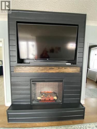 216 Second Avenue N, Yorkton, SK - Indoor Photo Showing Other Room With Fireplace