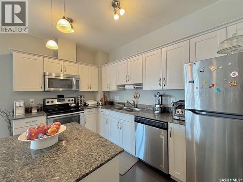 202 702 Hart Road, Saskatoon, SK - Indoor Photo Showing Kitchen With Double Sink