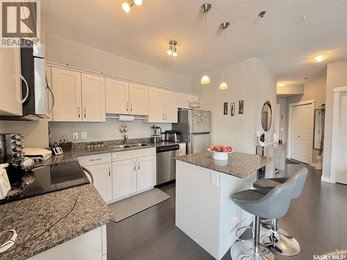 202 702 Hart Road, Saskatoon, SK - Indoor Photo Showing Kitchen With Double Sink