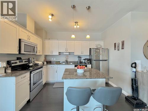 202 702 Hart Road, Saskatoon, SK - Indoor Photo Showing Kitchen With Double Sink
