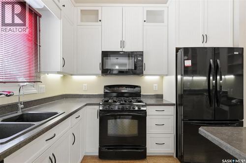 117 Mount Allison Crescent, Saskatoon, SK - Indoor Photo Showing Kitchen With Double Sink