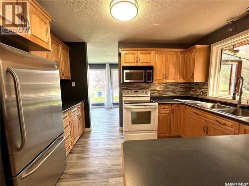116 6Th Street E, Nipawin, SK - Indoor Photo Showing Kitchen With Double Sink