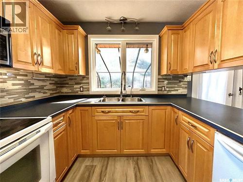 116 6Th Street E, Nipawin, SK - Indoor Photo Showing Kitchen With Double Sink