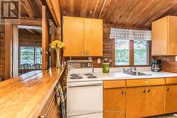 Kitchen view from hallway showing breakfast bar - 