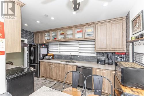 7648 Redstone Road, Mississauga, ON - Indoor Photo Showing Kitchen With Double Sink